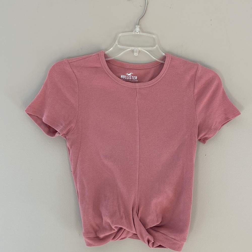 Pink, soft, twist front, short sleeve, ribbed Hollister brand T shirt.